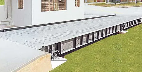Pitless weighbridge platform on side-support beams with load cell mounts reachable above ground
